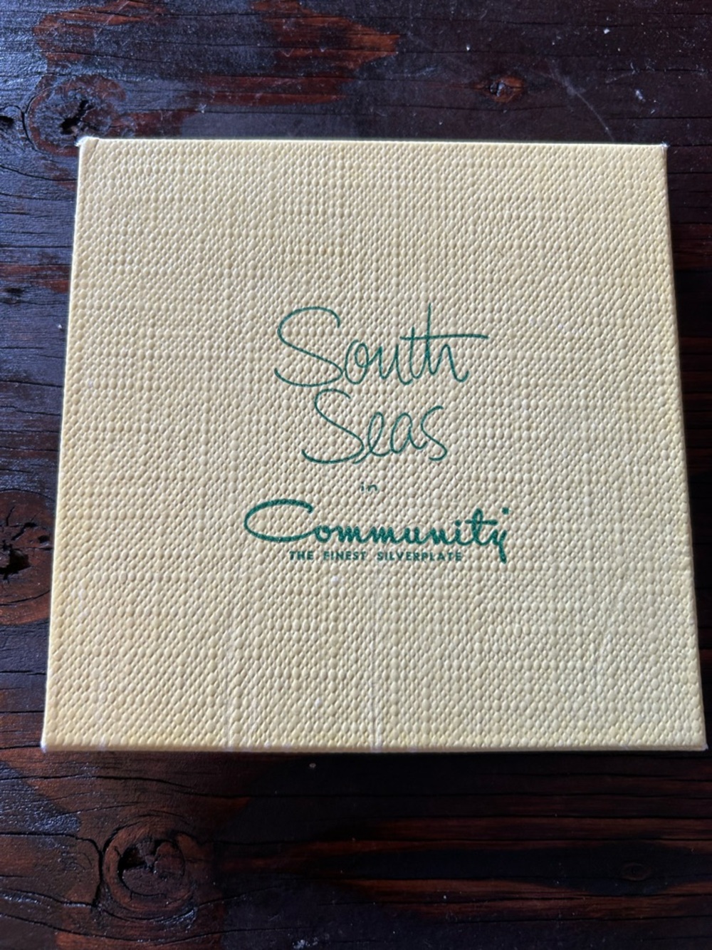 Oneida South Seas Community Box in pastel yellow with Green Logo